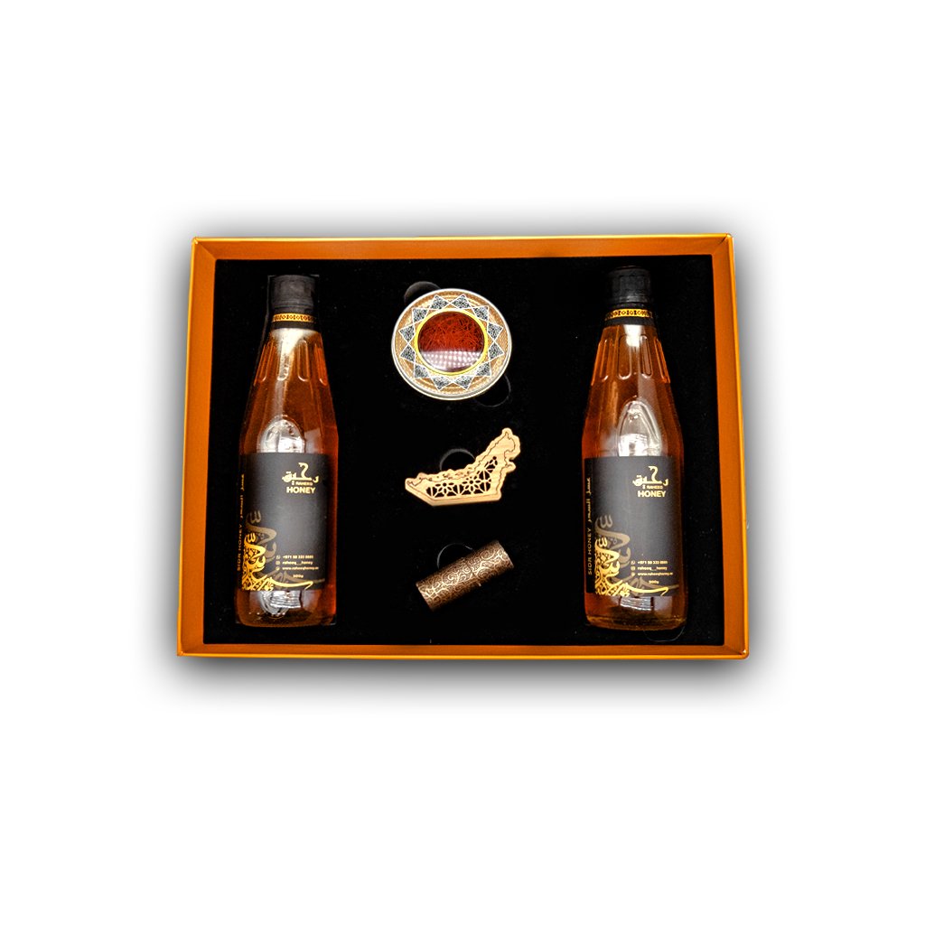 A luxurious honey gift set crafted for special occasions. Premium raw honey in elegant packaging – the perfect choice for Eid, weddings, and corporate gifts. Delight your loved ones with our Exclusive Honey Gift Set, a premium collection of our finest raw and infused honeys. Beautifully packaged in a luxury gift box with traditional